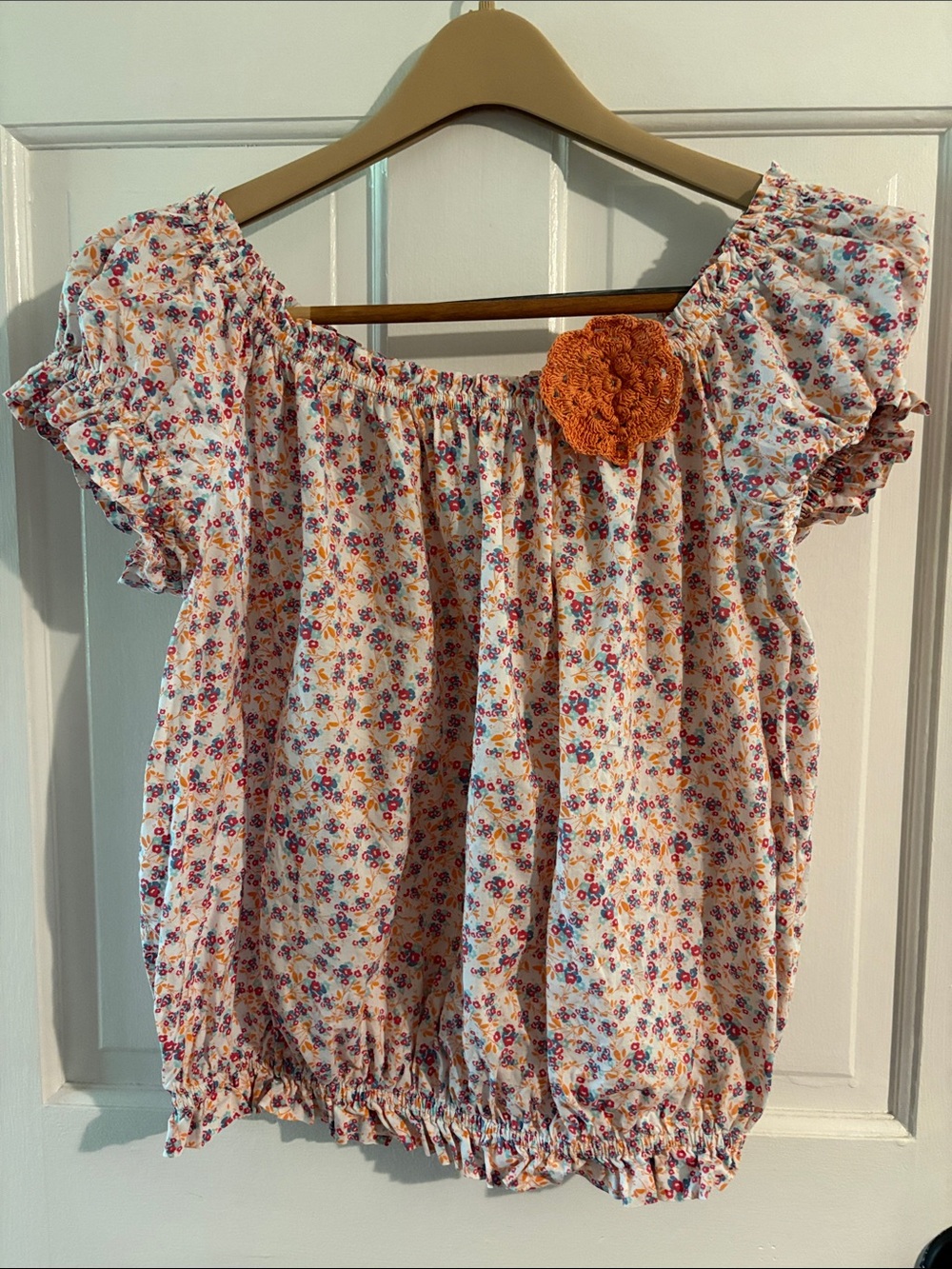 Red Camel White Floral Off-Shoulder Top with Orange Crochet Flower